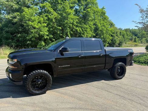 Used 2017 Chevrolet Silverado 1500 LT w/ LPO, Black Pack AWD/4WD image 2