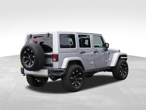 Used 2013 Jeep Wrangler Unlimited Sahara w/ Dual Top Group AWD/4WD image 9