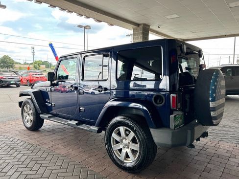 Used 2013 Jeep Wrangler Unlimited Sahara w/ Max Tow Pkg AWD/4WD image 9