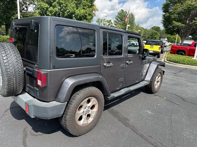 Used 2014 Jeep Wrangler Unlimited Sahara w/ Connectivity Group AWD/4WD image 2