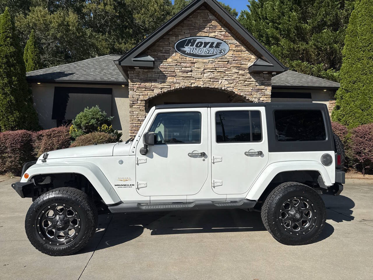 Used 2013 Jeep Wrangler Unlimited Sahara w/ Dual Top Group AWD/4WD image 1