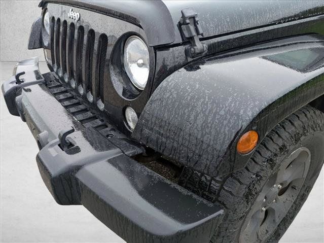 Used 2014 Jeep Wrangler Unlimited Sahara AWD/4WD image 9