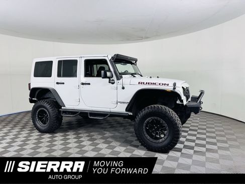 Used 2015 Jeep Wrangler Unlimited Rubicon w/ Dual Top Group AWD/4WD image 1