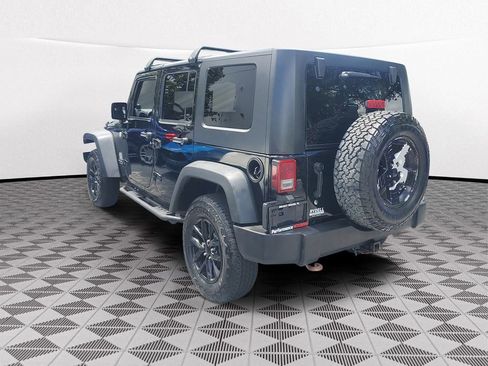 Used 2009 Jeep Wrangler Unlimited Rubicon w/ Dual Top Group AWD/4WD image 4