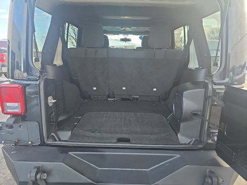 Used 2012 Jeep Wrangler Unlimited Sahara w/ Dual Top Group AWD/4WD image 9