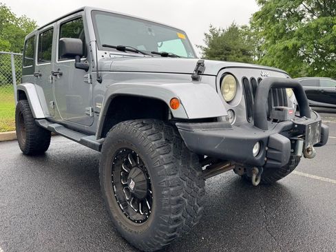 Used 2015 Jeep Wrangler Unlimited Sahara w/ Connectivity Group AWD/4WD image 1