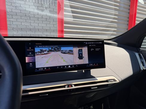 Used 2024 BMW iX xDrive50 w/ Premium Package image 25