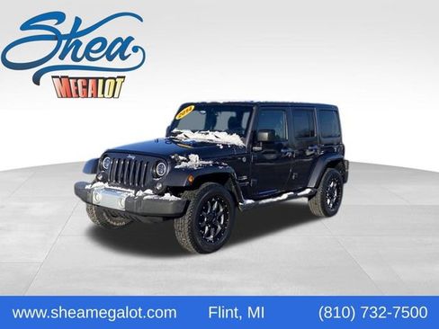 Used 2014 Jeep Wrangler Unlimited Sahara w/ Max Tow Package image 1