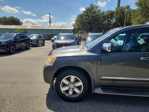 Used 2011 Nissan Armada Platinum w/ 2nd Row Captain Seat Pkg RWD image 2