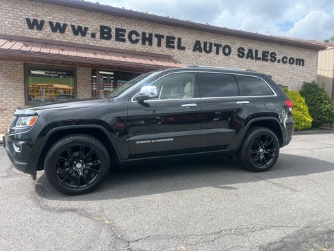 Used 2014 Jeep Grand Cherokee Limited AWD/4WD image 1