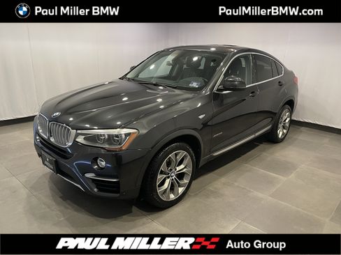 Used 2016 BMW X4 xDrive35i AWD/4WD image 1