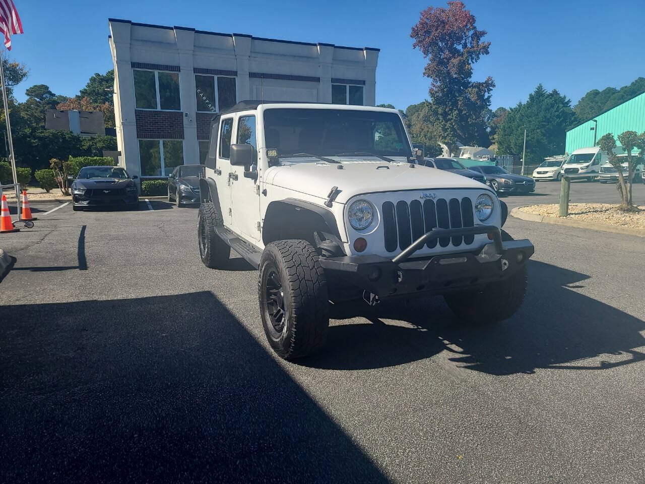 Used 2013 Jeep Wrangler Unlimited Sport AWD/4WD image 1