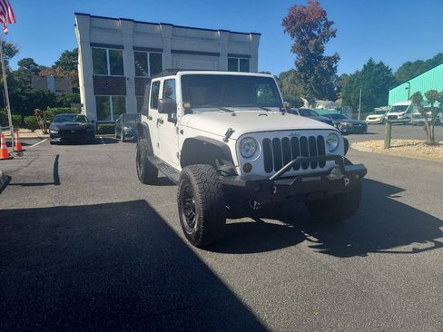 Used 2013 Jeep Wrangler Unlimited Sport AWD/4WD image 1