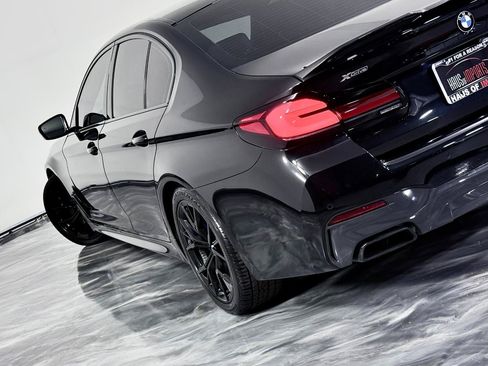 Used 2021 BMW M550i xDrive w/ Dynamic Handling Package AWD/4WD image 13