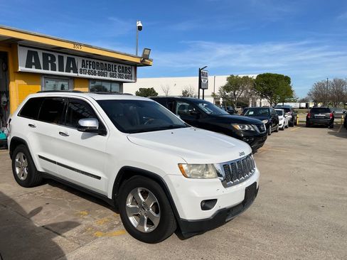 Used 2013 Jeep Grand Cherokee Overland w/ Advance Technology Group AWD/4WD image 1