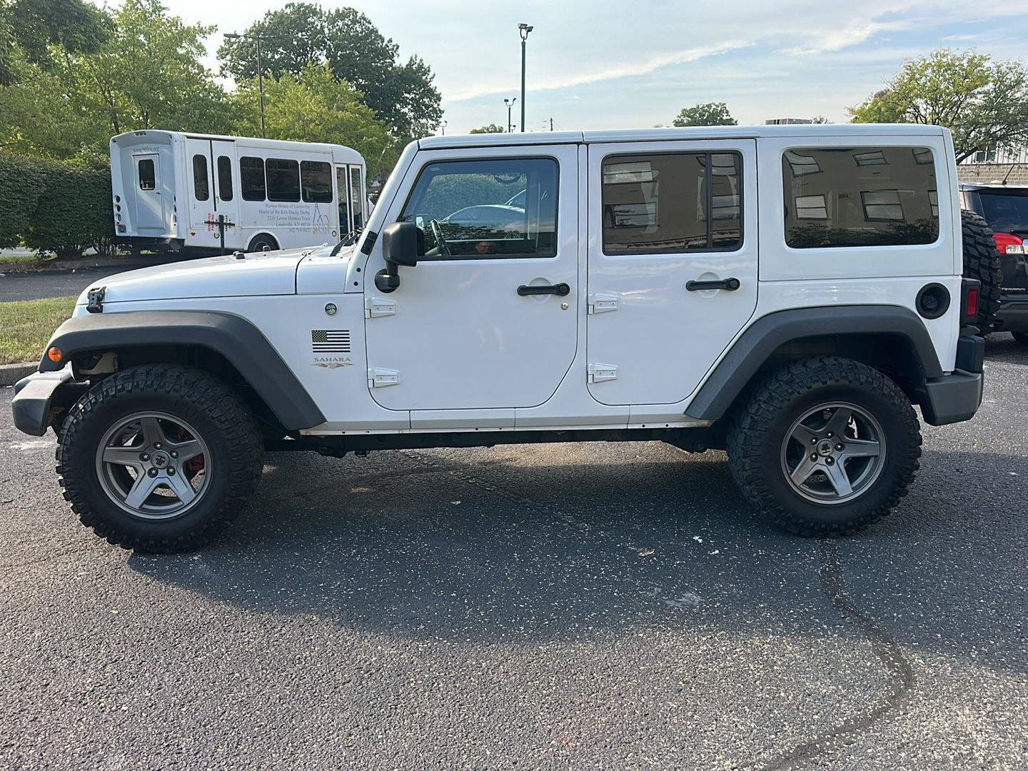 Used 2013 Jeep Wrangler Unlimited Sahara AWD/4WD image 6