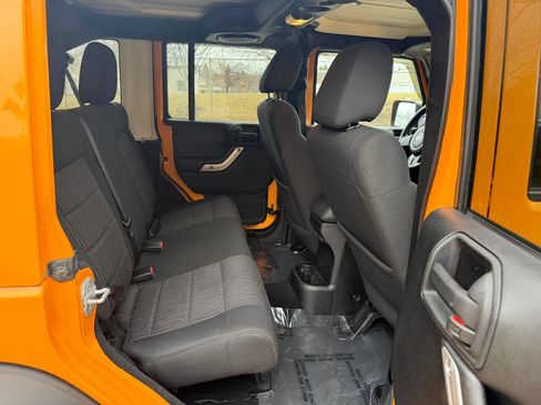 Used 2012 Jeep Wrangler Unlimited Sahara w/ Dual Top Group image 28