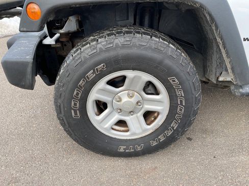 Used 2012 Jeep Wrangler Unlimited Sport w/ Black Appearance Group image 24