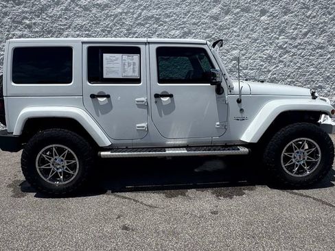 Used 2014 Jeep Wrangler Unlimited Sahara w/ Mopar Chrome Edition Group AWD/4WD image 2