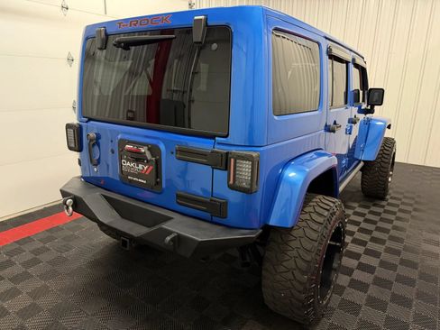 Used 2015 Jeep Wrangler Unlimited Sahara w/ Max Tow Package AWD/4WD image 21