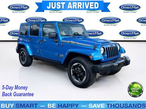 Used 2014 Jeep Wrangler Unlimited Sahara AWD/4WD image 1