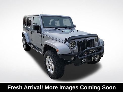Used 2014 Jeep Wrangler Unlimited Sahara w/ Connectivity Group AWD/4WD image 1