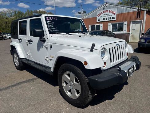 Used 2012 Jeep Wrangler Unlimited Sahara w/ Dual Top Group AWD/4WD image 3