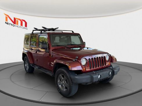 Used 2010 Jeep Wrangler Unlimited Sahara w/ Dual Top Group AWD/4WD image 7