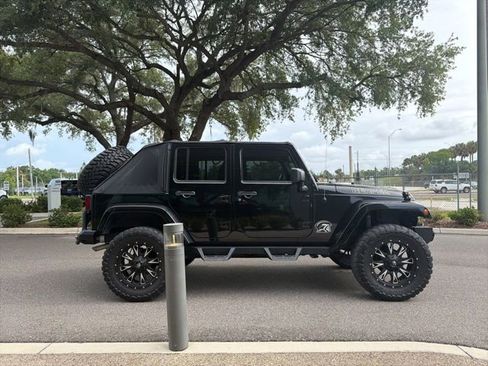 Used 2015 Jeep Wrangler Unlimited Sahara w/ Dual Top Group AWD/4WD image 3