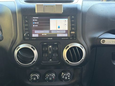 Used 2014 Jeep Wrangler Unlimited Sahara w/ Dual Top Group AWD/4WD image 28