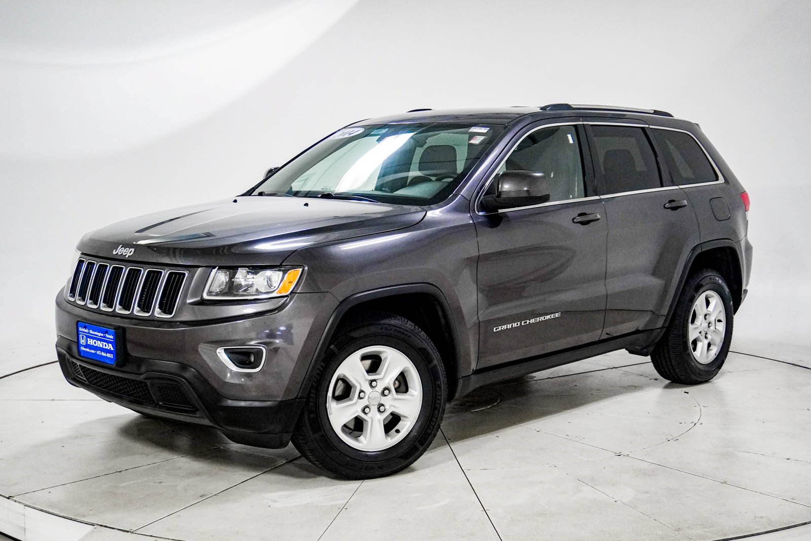 Used 2014 Jeep Grand Cherokee Laredo w/ Quick Order Package 23E AWD/4WD image 1