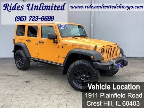 Used 2013 Jeep Wrangler Unlimited Sahara w/ Dual Top Group AWD/4WD image 9