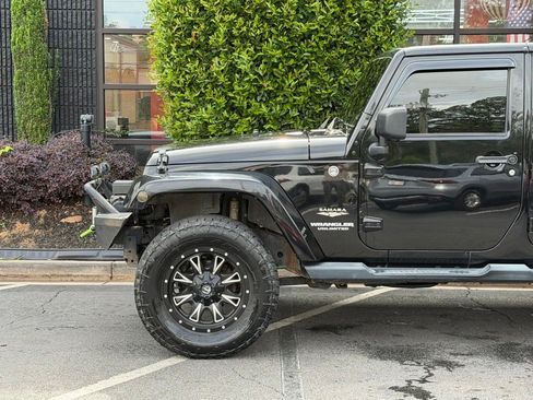Used 2013 Jeep Wrangler Unlimited Sahara w/ Connectivity Group AWD/4WD image 10