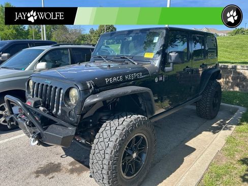 Used 2014 Jeep Wrangler Unlimited Rubicon w/ Connectivity Group AWD/4WD image 1