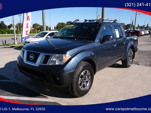 Used 2021 Nissan Frontier PRO-4X w/ Pro-4x Utility Package AWD/4WD image 1