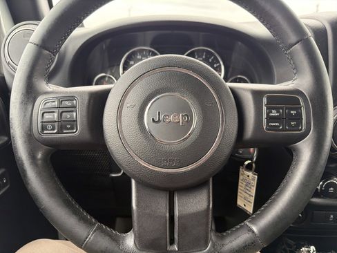 Used 2012 Jeep Wrangler Unlimited Sport AWD/4WD image 24