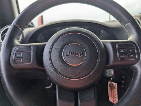 Used 2014 Jeep Wrangler Unlimited Sahara AWD/4WD image 14