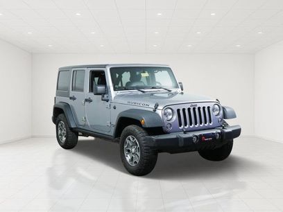 Used 2014 Jeep Wrangler Unlimited Rubicon w/ Dual Top Group