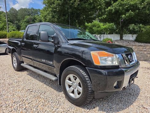 Used 2014 Nissan Titan SV w/ SV Premium Utility Package AWD/4WD image 1