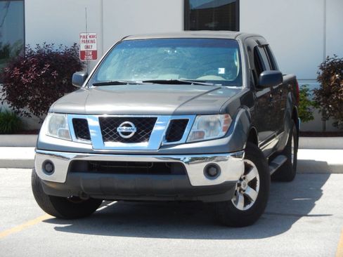 Used 2009 Nissan Frontier SE w/ SE Value Truck Pkg AWD/4WD image 4