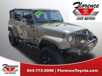 Used 2013 Jeep Wrangler Unlimited Sahara image 1
