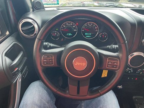 Used 2011 Jeep Wrangler Unlimited Sahara w/ Dual Top Group AWD/4WD image 17
