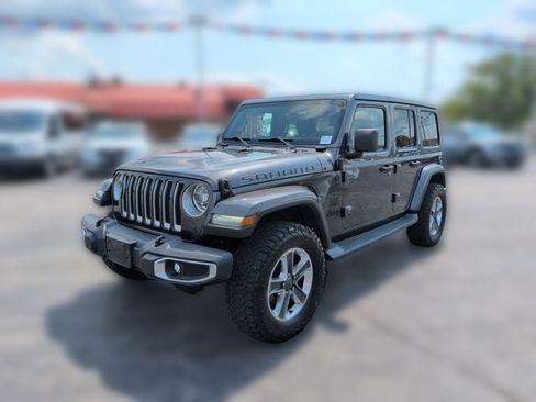 Used 2018 Jeep Wrangler Unlimited Sahara w/ Cold Weather Group AWD/4WD image 1