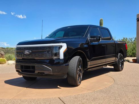 Used 2024 Ford F150 Lightning Platinum w/ Platinum Black Package AWD/4WD image 1
