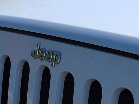 Used 2014 Jeep Wrangler Unlimited Sahara w/ Dual Top Group AWD/4WD image 11