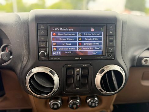 Used 2012 Jeep Wrangler Unlimited Sahara w/ Dual Top Group AWD/4WD image 16