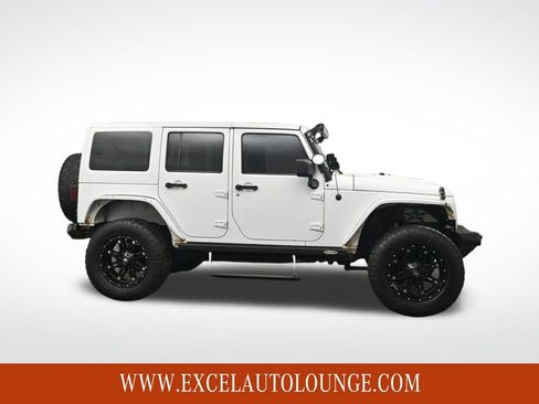 Used 2014 Jeep Wrangler Unlimited Sahara w/ Dual Top Group image 7