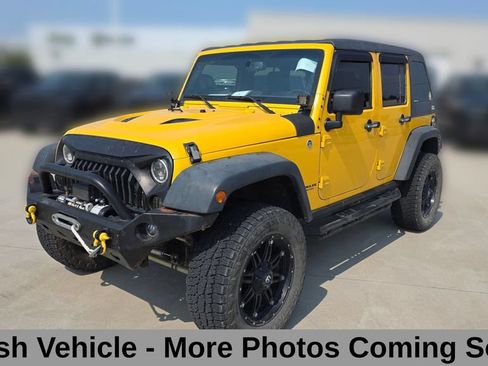 Used 2015 Jeep Wrangler Unlimited Rubicon w/ Connectivity Group AWD/4WD image 1