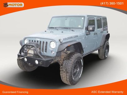 Used 2014 Jeep Wrangler Unlimited Rubicon w/ Dual Top Group