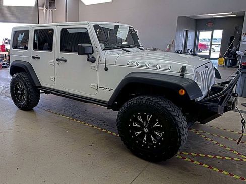 Used 2013 Jeep Wrangler Unlimited Sahara image 1